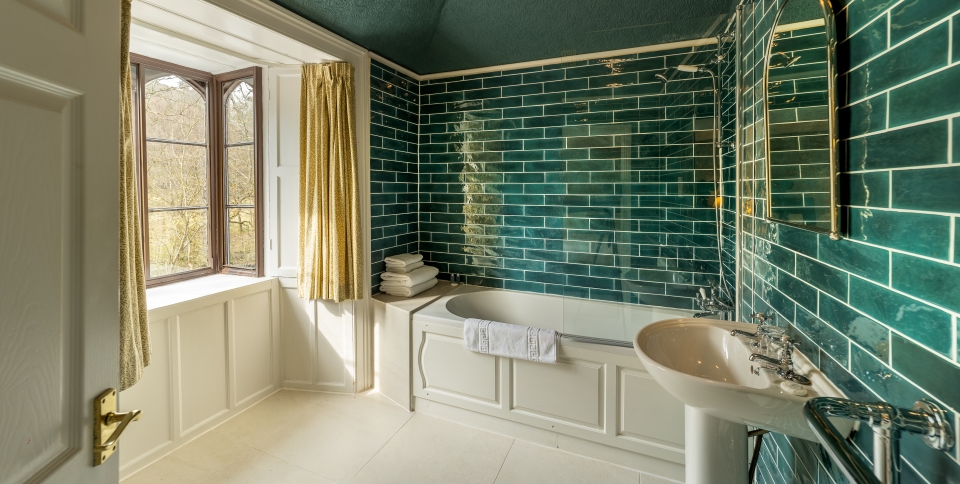 Light and spacious bathroom with bath